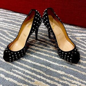 Spike Black Louboutin heels.